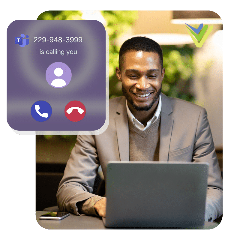 Business professional receiving a call on Microsoft Teams synced with their office VoIP phone system.